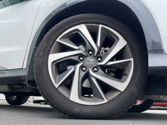ホンダ ヴェゼル ツーリング・ホンダセンシング 神奈川県 2020(令2)年 5万km プラチナホワイトパール 純正８インチＳＤナビ（VXM-207VFEi）/ワンセグ/Bluetooth/CD/DVD/iPod/USB/追従式クルーズコントロール/前席シートヒーター/パドルシフト/LEDヘッドライト/純正アルミホイール/純正フロアマット/ブレーキホールド/レーンキープアシスト/横滑り防止装置/電動格納ミラー/ドアバイザー/衝突被害軽減システム/カーテンエアバック