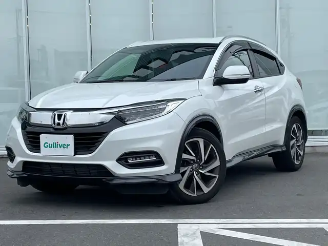ホンダ ヴェゼル ツーリング・ホンダセンシング 神奈川県 2020(令2)年 5万km プラチナホワイトパール 純正８インチＳＤナビ（VXM-207VFEi）/ワンセグ/Bluetooth/CD/DVD/iPod/USB/追従式クルーズコントロール/前席シートヒーター/パドルシフト/LEDヘッドライト/純正アルミホイール/純正フロアマット/ブレーキホールド/レーンキープアシスト/横滑り防止装置/電動格納ミラー/ドアバイザー/衝突被害軽減システム/カーテンエアバック