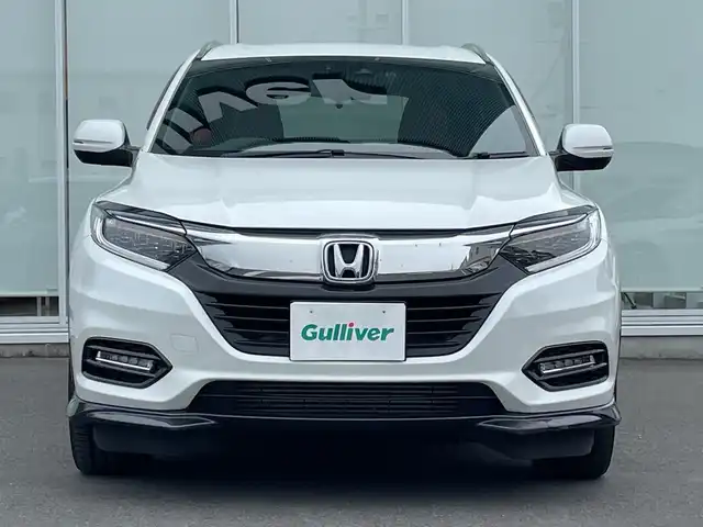ホンダ ヴェゼル ツーリング・ホンダセンシング 神奈川県 2020(令2)年 5万km プラチナホワイトパール 純正８インチＳＤナビ（VXM-207VFEi）/ワンセグ/Bluetooth/CD/DVD/iPod/USB/追従式クルーズコントロール/前席シートヒーター/パドルシフト/LEDヘッドライト/純正アルミホイール/純正フロアマット/ブレーキホールド/レーンキープアシスト/横滑り防止装置/電動格納ミラー/ドアバイザー/衝突被害軽減システム/カーテンエアバック