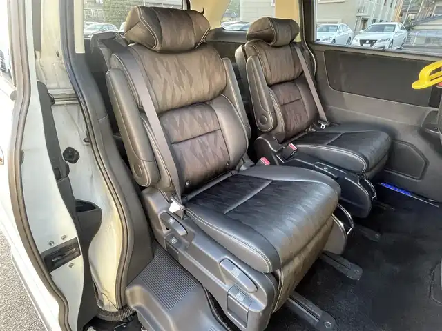 ホンダ オデッセイ ハイブリッド アブソルート・EXホンダセンジング 山口県 2018(平30)年 1.9万km プラチナホワイトパール 純正ディーラーOPナビ/（SD/フルセグ/DISC/USB/iPod/BT/ラジオ）/Apple Car Play/全方位カメラ/ハーフレザーシート/シートヒーター/エンジンスターター/前後ドライブレコーダー/ビルトインETC2.0/レーダークルーズコントロール/ブラインドスポットモニター/D/N席パワーシート/両側電動スライドドア/リヤオートエアコン/オートブレーキホールド/ドアバイザー/フォグライト/純正フロアマット/LEDヘッドライト