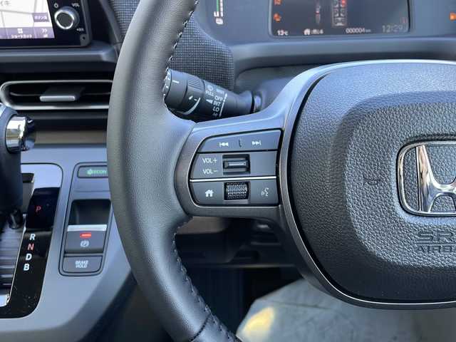 ホンダ フリード ハイブリット e:HEV AIR EX 山口県 2025(令7)年 0.1千km プラチナホワイトパール 登録済未使用車/純正9インチナビ/・applecarplay/・androidauto/・フルセグTV/・Bluetooth接続/アラウンドビューモニター/Honda SENSING/・衝突軽減ブレーキ/・踏み間違い衝突軽減システム/・急アクセル抑制機能/・路外逸脱抑制機能/・歩行者事故低減ステアリング/・渋滞追従機能付アダプティブクルーズコントロール/・車線維持支援システム/・トラフィックジャムアシスト/・先行車発進お知らせ機能/・アダプティブドライビングビーム/・標識認識機能/・ブラインドスポットインフォメーション/・後退出庫サポート/ハーフレザーシート/シートヒーター/USB入力端子/スマートキー/プッシュスタート/スペアキー1本/両側パワースライドドア/純正LEDライト/純正15インチアルミホイール/ウィンカーミラー/保証書/取り扱い説明書