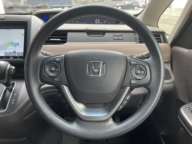 ホンダ フリード G ホンダセンシング 滋賀県 2020(令2)年 2.7万km ミッドナイトブルービームM 禁煙車/純正９型ナビ/（CD/DVD/SD/USB/Bluetooth/フルセグTV）/バックカメラ/ビルトインETC/両側電動スライドドア/路外逸脱抑制システム/レーンキープアシストシステム/衝突被害軽減システム/標識認識機能/アダプティブクルーズコントロール/ステアリングリモコン/シートヒーター/LEDヘッドライト/オートヘッドライト/フロント熱線/純正フロアマット/オートリトラーミラー/リアロールサンシェイド/スマートキー