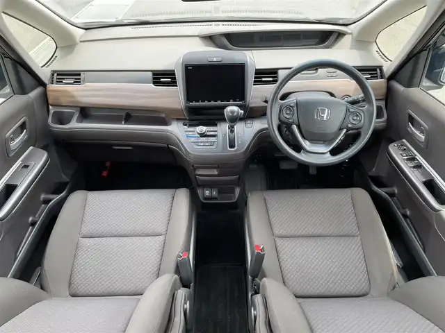 ホンダ フリード G ホンダセンシング 滋賀県 2020(令2)年 2.7万km ミッドナイトブルービームM 禁煙車/純正９型ナビ/（CD/DVD/SD/USB/Bluetooth/フルセグTV）/バックカメラ/ビルトインETC/両側電動スライドドア/路外逸脱抑制システム/レーンキープアシストシステム/衝突被害軽減システム/標識認識機能/アダプティブクルーズコントロール/ステアリングリモコン/シートヒーター/LEDヘッドライト/オートヘッドライト/フロント熱線/純正フロアマット/オートリトラーミラー/リアロールサンシェイド/スマートキー