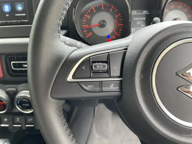 スズキ ジムニー シエラ JC 滋賀県 2024(令6)年 0.3万km ブルーイッシュブラックパール3 禁煙車/ディスプレイオーディオ/Bluetooth/USB/SD/AppleCarPlay/AndroidAuto/バックカメラ/クルーズコントロール/コーナーセンサー/LEDヘッドライト/オートライト/デュアルセンサーブレーキ/シートヒーター/プッシュスタート/ヘッドライトウォッシャー/プッシュスタート/スマートキー/アイドリングストップ/純正アルミホイール