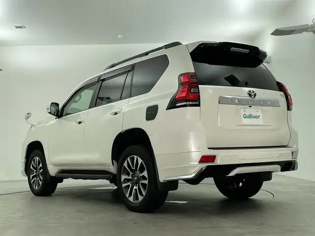 トヨタ ランドクルーザー プラド TX Lパッケージ 福島県 2023(令5)年 1.6万km ホワイトパールクリスタルシャイン 7人乗り/寒冷地仕様/モデリスタエアロ/サンルーフ/ルーフレール/純正OP19インチアルミホイール/純正9インチナビ(CD/DVD/Bluetooth/フルセグTV)/バックカメラ/前後ドライブレコーダー/ベージュレザーシート/前席パワーシート/前席シートヒーター/前席シートベンチレーション/トヨタセーフティーセンス/前後コーナーセンサー/ビルトインETC2.0/スペアキー×1/新車時保証書＆取扱説明書