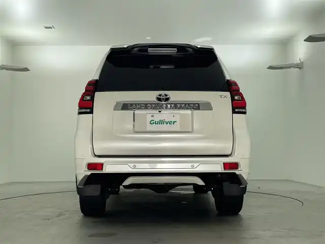 トヨタ ランドクルーザー プラド TX Lパッケージ 福島県 2023(令5)年 1.6万km ホワイトパールクリスタルシャイン 7人乗り/寒冷地仕様/モデリスタエアロ/サンルーフ/ルーフレール/純正OP19インチアルミホイール/純正9インチナビ(CD/DVD/Bluetooth/フルセグTV)/バックカメラ/前後ドライブレコーダー/ベージュレザーシート/前席パワーシート/前席シートヒーター/前席シートベンチレーション/トヨタセーフティーセンス/前後コーナーセンサー/ビルトインETC2.0/スペアキー×1/新車時保証書＆取扱説明書
