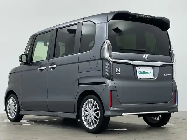 ホンダ Ｎ ＢＯＸ カスタム L ターボ 鹿児島県 2021(令3)年 1.8万km シャイニンググレーM 純正8型ナビ/（AM/FM/CD/DVD/Bluetooth/フルセグ）/バックカメラ/両側パワースライドドア/ホンダセンシング/レーダークルーズコントロール/レーンキープアシスト/オートライト/オートハイビーム/前後ドライブレコーダー/パドルシフト/ハーフレザーシート/シートヒーター/ETC/LEDヘッドライト/スマートキー/純正フロアマット