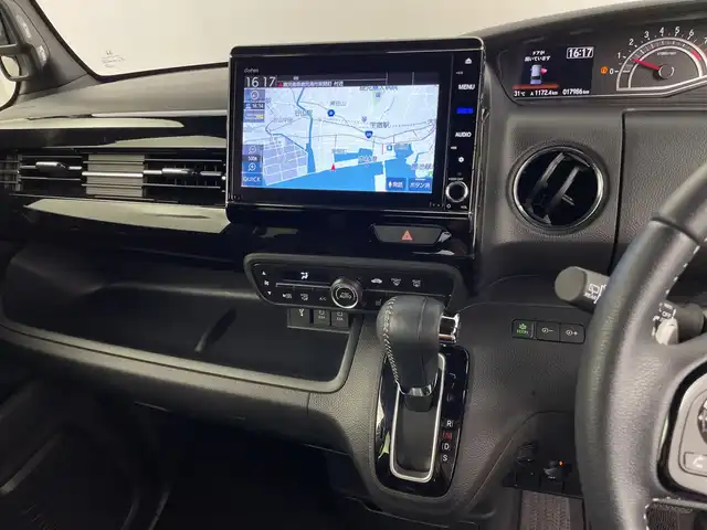 ホンダ Ｎ ＢＯＸ カスタム L ターボ 鹿児島県 2021(令3)年 1.8万km シャイニンググレーM 純正8型ナビ/（AM/FM/CD/DVD/Bluetooth/フルセグ）/バックカメラ/両側パワースライドドア/ホンダセンシング/レーダークルーズコントロール/レーンキープアシスト/オートライト/オートハイビーム/前後ドライブレコーダー/パドルシフト/ハーフレザーシート/シートヒーター/ETC/LEDヘッドライト/スマートキー/純正フロアマット