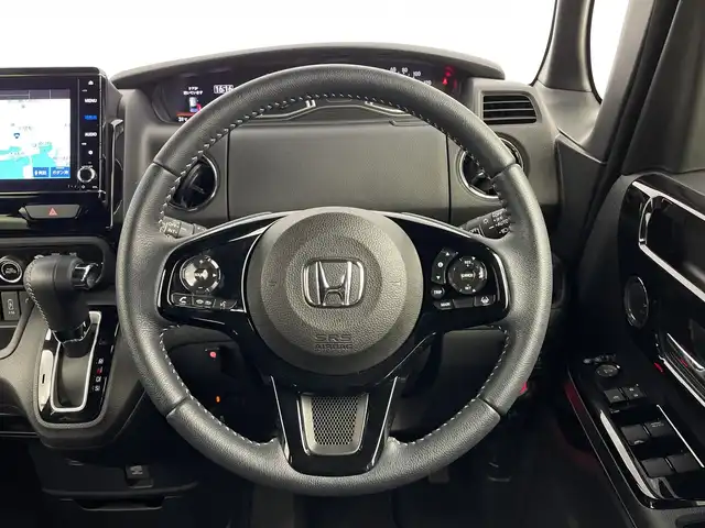 ホンダ Ｎ ＢＯＸ カスタム L ターボ 鹿児島県 2021(令3)年 1.8万km シャイニンググレーM 純正8型ナビ/（AM/FM/CD/DVD/Bluetooth/フルセグ）/バックカメラ/両側パワースライドドア/ホンダセンシング/レーダークルーズコントロール/レーンキープアシスト/オートライト/オートハイビーム/前後ドライブレコーダー/パドルシフト/ハーフレザーシート/シートヒーター/ETC/LEDヘッドライト/スマートキー/純正フロアマット