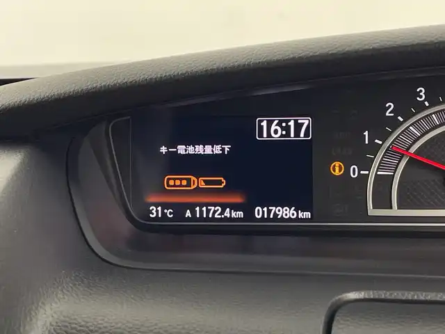 ホンダ Ｎ ＢＯＸ カスタム L ターボ 鹿児島県 2021(令3)年 1.8万km シャイニンググレーM 純正8型ナビ/（AM/FM/CD/DVD/Bluetooth/フルセグ）/バックカメラ/両側パワースライドドア/ホンダセンシング/レーダークルーズコントロール/レーンキープアシスト/オートライト/オートハイビーム/前後ドライブレコーダー/パドルシフト/ハーフレザーシート/シートヒーター/ETC/LEDヘッドライト/スマートキー/純正フロアマット
