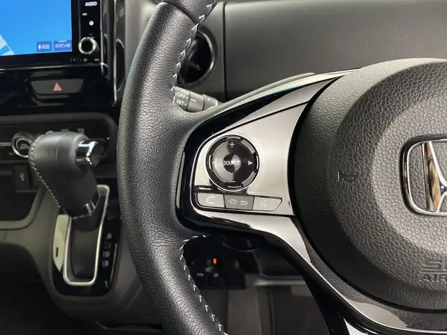 ホンダ Ｎ ＢＯＸ カスタム L ターボ 鹿児島県 2021(令3)年 1.8万km シャイニンググレーM 純正8型ナビ/（AM/FM/CD/DVD/Bluetooth/フルセグ）/バックカメラ/両側パワースライドドア/ホンダセンシング/レーダークルーズコントロール/レーンキープアシスト/オートライト/オートハイビーム/前後ドライブレコーダー/パドルシフト/ハーフレザーシート/シートヒーター/ETC/LEDヘッドライト/スマートキー/純正フロアマット