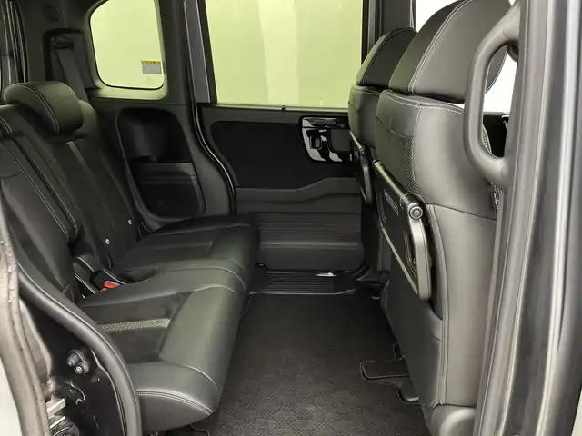 ホンダ Ｎ ＢＯＸ カスタム L ターボ 鹿児島県 2021(令3)年 1.8万km シャイニンググレーM 純正8型ナビ/（AM/FM/CD/DVD/Bluetooth/フルセグ）/バックカメラ/両側パワースライドドア/ホンダセンシング/レーダークルーズコントロール/レーンキープアシスト/オートライト/オートハイビーム/前後ドライブレコーダー/パドルシフト/ハーフレザーシート/シートヒーター/ETC/LEDヘッドライト/スマートキー/純正フロアマット