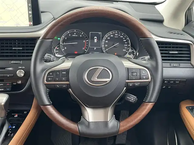 レクサス ＲＸ 300 バージョンL 滋賀県 2020(令2)年 1.5万km グラファイトブラックガラスフレーク 純正12.3インチメモリナビ/(CD DVD フルセグTV Bluetooth)/レクサスセーフティ/・衝突軽減ブレーキ/・車線逸脱警報/・レーントレーシングアシスト/・レーダークルーズコントロール/・ブラインドスポットモニター/・道路標識認識機能/茶革シート/パワーシート/シートヒーター・エアシート/パワーバックドア/ウッドコンビステアリング/ステアリングヒーター/ステアリングリモコン/パドルシフト/ヘッドアップディスプレイ/前後ドライブレコーダー/ビルトインETC2.0/プッシュスタート/スマートキー×２/電動パーキングブレーキ/オートブレーキホールド/純正フロアマット/LEDヘッドライト/オートライト/オートマチックハイビーム