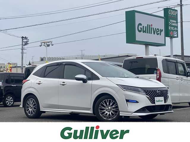 日産 ノート オーテック FOUR 青森県 2022(令4)年 1.3万km ピュアホワイトパール ワンオーナー/４WD/純正メモリナビ/（BT／AM／FM／DVD）/純正エアロ/全周囲方位カメラ/黒レザーシート（AUTCH）/シートヒーター（運転席＋助手席）/ステアリングスイッチ/ステアリングヒーター/LEDヘッドライト/オートマチックハイビーム/ビルトインETC/ドライブレコーダー（前後）/デジタルルームミラー/スペアキー/保証書/取り扱い説明書