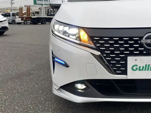 日産 ノート オーテック FOUR 青森県 2022(令4)年 1.3万km ピュアホワイトパール ワンオーナー/４WD/純正メモリナビ/（BT／AM／FM／DVD）/純正エアロ/全周囲方位カメラ/黒レザーシート（AUTCH）/シートヒーター（運転席＋助手席）/ステアリングスイッチ/ステアリングヒーター/LEDヘッドライト/オートマチックハイビーム/ビルトインETC/ドライブレコーダー（前後）/デジタルルームミラー/スペアキー/保証書/取り扱い説明書