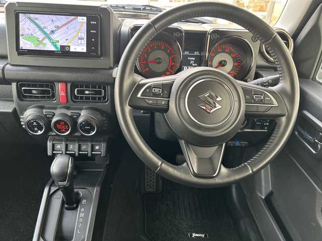 スズキ ジムニー XC 大阪府 2019(平31)年 4万km ジャングルグリーン ECLIPSEメモリーナビゲーション/SD/DVD/Bluetooth/フルセグ/スズキセーフティサポート/・デュアルセンサーブレーキサポート/・誤発信抑制機能/・車線逸脱警報機能/・ふらつき警報機能/・先行車発進お知らせ機能/・標識認識機能/・ハイビームアシスト/クルーズコントロール/ETC/オートライト/ヘッドライトウォッシャー/前席シートヒーター/フロントフォグライト/純正アルミホイール/スペアキー