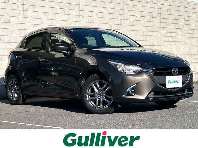 マツダ デミオ XDテーラードブラウン 茨城県 2017(平29)年 9.5万km チタニウムフラッシュマイカ 特別使用車:テーラードブラウン/純正メモリナビ/(地デジTV・CD・DVD・BT・ラジオ再生)/クルーズコントロール/衝突軽減ブレーキ/ETC/オートライト/LEDヘッドライト/純正16inアルミホイール/純正フロアマット/スマートキー/スペアキー/取扱説明書/保証書