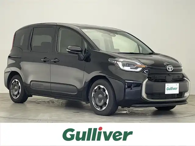 トヨタ シエンタ ハイブリッド Z 滋賀県 2024(令6)年 0.5万km ブラック 禁煙車/純正10.5型ディスプレイオーディオ/（Miracast/Bluetooth/フルセグTV）/パノラミックビューモニター/純正12.1型フリップダウンモニター/ビルトインETC/両側電動スライドドア/プリクラッシュセーフティー/レーンディパーチャーアラート/ブラインドスポットモニター/プロアクティブドライビングアシスト/クリアランスソナー/リアクロストラフィックアラート/パーキングサポートブレーキ/ロードサインアシスト/LEDヘッドライト/オートヘッドライト/オートマチックハイビーム/革巻きステアリング/レーダークルーズコントロール/ステアリングリモコン/USB充電/AC100V/オートリトラーミラー/純正フロアマット/リアロールサンシェイド