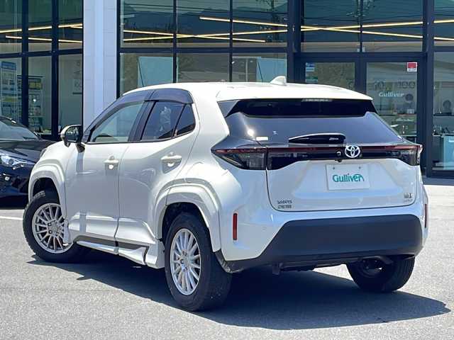 トヨタ ヤリスクロス ハイブリッド Z 長野県 2021(令3)年 1.7万km ホワイトパールクリスタルシャイン 4WD/モデリスタエアロ（F・S・R）/純正ディスプレイオーディオ/FM・AM・フルセグTV・BT/AppleCarPlay対応/バックカメラ/前後ドライブレコーダー（DC-DR652）/レーダークルーズコントロール/衝突被害軽減ブレーキ/前後コーナーセンサー/ダウンヒルコントロール/革巻きステアリング/ステアリングヒーター/ハーフレザーシート/前席パワーシート/AC100V電源/電動パーキング/オートホールド/LEDヘッドライト/オートハイビーム/オートライト/プッシュスタート/スマートキー/ETC