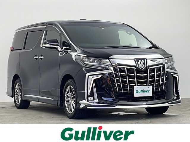 トヨタ アルファードハイブリット エグゼクティブ ラウンジ S 千葉県 2022(令4)年 3.6万km 黒 トヨタセーフティーセンス/・プリクラッシュセーフティ/・レーントレーシングアシスト/・車線維持支援機能/・車線逸脱警報機能/・車線逸脱抑制機能/・ふらつき警報機能/・レーダークルーズコントロール/・ロードサインアシスト/・ブラインドスポットモニター/・インテリジェントクリアランスソナー/・デジタルインナーミラー/・パノラミックビューモニター/・インテリジェントパーキングアシスト/ツインムーンルーフ/両側パワースライドドア/モデリスタエアロ/純正メモリナビ/・CD DVD BT HDMI USB TV リアエンターテイメント/JBLプレミアムサウンド/フリップダウンモニター/ビルトインETC2.0/100V充電/電動リアゲート/電動パーキングブレーキ/オートホールドスイッチ/3眼LEDライト/シーケンシャルウィンカー/フォグランプ/ドアバイザー/純正17インチアルミホイール/純正フロアマット/本革シート/シートヒーター/シートクーラー/メモリ式パワーシート/オットマン/プッシュスタート/スマートキー/禁煙車