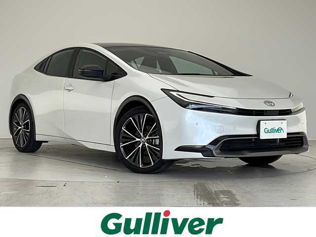 トヨタ プリウス Z 愛知県 2023(令5)年 2.5万km プラチナホワイトパールマイカ 衝突被害軽減ブレーキ/純正ディスプレイオーディオナビ（あり）/全方位カメラ/ガラスルーフ/レーダークルーズコントロール/シートヒーター/エアーシート/フルセグTV/Bluetooth/バックカメラ/電動リアゲート/コーナーセンサー/純正アルミホイール/ETC2.0/ブラインドスポットモニター/LEDヘッドライト/ステアリングヒーター/インテリジェントミラー/パワーシート/オートマチックハイビーム/置くだけ充電器/ドライブレコーダー/ステアリングスイッチ/スマートキー/プッシュスタート