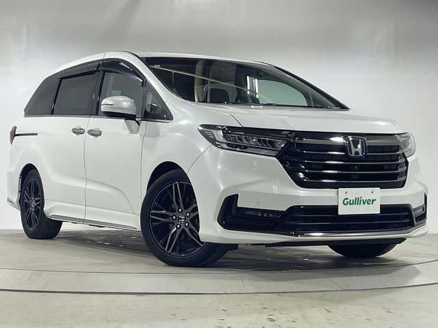 ホンダ オデッセイ ハイブリッド e:HEVアブソルート EX 神奈川県 2021(令3)年 5.9万km プラチナホワイトパール ホンダセンシング/純正10インチメモリナビ/　CD/DVD/BT/フルセグ/両側パワースライドドア/アラウンドビューモニター/レーダークルーズコントロール/LEDオートライト/ハーフレザーシート/シートヒーター/純正18インチアルミホイール/ステアリングスイッチ/USBポート/ビルトインETC2.0