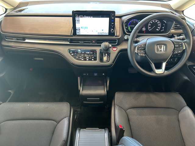 ホンダ オデッセイ ハイブリッド e:HEVアブソルート EX 神奈川県 2021(令3)年 5.9万km プラチナホワイトパール ホンダセンシング/純正10インチメモリナビ/　CD/DVD/BT/フルセグ/両側パワースライドドア/アラウンドビューモニター/レーダークルーズコントロール/LEDオートライト/ハーフレザーシート/シートヒーター/純正18インチアルミホイール/ステアリングスイッチ/USBポート/ビルトインETC2.0