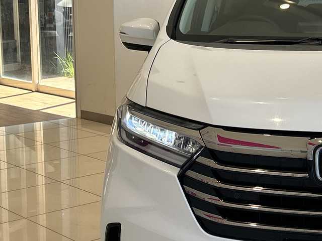 ホンダ オデッセイ ハイブリッド e:HEVアブソルート EX 神奈川県 2021(令3)年 5.9万km プラチナホワイトパール ホンダセンシング/純正10インチメモリナビ/　CD/DVD/BT/フルセグ/両側パワースライドドア/アラウンドビューモニター/レーダークルーズコントロール/LEDオートライト/ハーフレザーシート/シートヒーター/純正18インチアルミホイール/ステアリングスイッチ/USBポート/ビルトインETC2.0