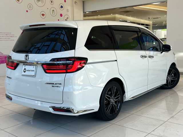 ホンダ オデッセイ ハイブリッド e:HEVアブソルート EX 神奈川県 2021(令3)年 5.9万km プラチナホワイトパール ホンダセンシング/純正10インチメモリナビ/　CD/DVD/BT/フルセグ/両側パワースライドドア/アラウンドビューモニター/レーダークルーズコントロール/LEDオートライト/ハーフレザーシート/シートヒーター/純正18インチアルミホイール/ステアリングスイッチ/USBポート/ビルトインETC2.0