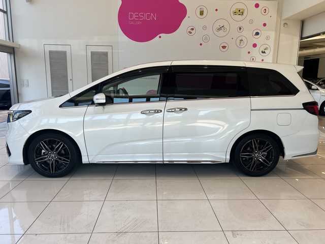 ホンダ オデッセイ ハイブリッド e:HEVアブソルート EX 神奈川県 2021(令3)年 5.9万km プラチナホワイトパール ホンダセンシング/純正10インチメモリナビ/　CD/DVD/BT/フルセグ/両側パワースライドドア/アラウンドビューモニター/レーダークルーズコントロール/LEDオートライト/ハーフレザーシート/シートヒーター/純正18インチアルミホイール/ステアリングスイッチ/USBポート/ビルトインETC2.0