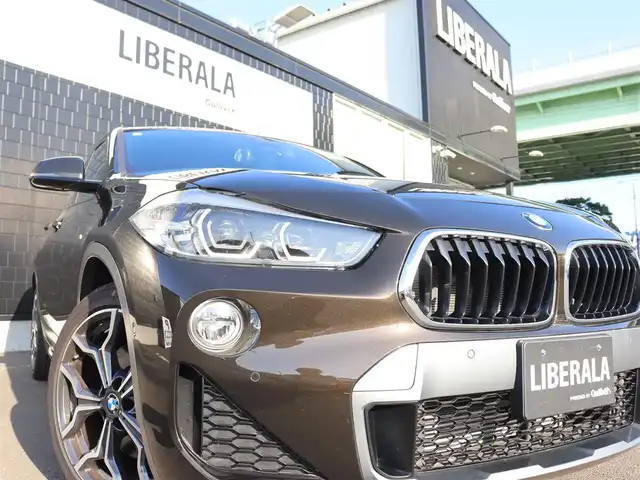 ＢＭＷ Ｘ２ xDrive20i MスポーツX 宮城県 2018(平30)年 2.4万km スパークリングストームブリリアントエフェクト ハイラインパッケージ/ブラックレザーシート/パワーシート/シートヒーター/メモリ付きシート/純正ＨＤＤナビ/バックカメラ/アンビエントライト/パーク・ディスタンス・コントロール/ダウンヒルアシストコントロール/クルーズコントロール/パーキングアシスト/レーンキープアシスト/パドルシフト/パワーバックドア/LEDヘッドライト/オートライト/アイドリングストップ/Bluetooth接続/プッシュスタート/スマートキー/純正19インチAW/前方ドライブレコーダー/ETC