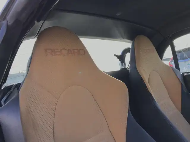ダイハツ コペン ULTIMATE EDⅡ 鳥取県 2007(平19)年 9.6万km ホワイトパールマイカ ターボ車/電動オープン/純正ディスプレイオーディオ/CD/DVD/BT/社外ETC/アルカンターラレカロシート/BBS15インチアルミホイール/MOMOステアリング/ビルシュタインサスペンション/前席シートヒーター/キセノンライト/MTモード付AT/キーレスキー/スペアキー