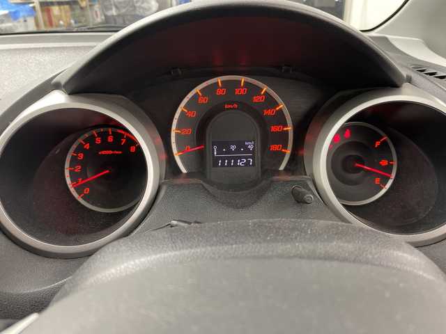 ホンダ フィット G 道央・札幌 2008(平20)年 11.2万km ミラノレッド ・純正ナビ（VXS-092CVi）/・CD/DVD/SD/ワンセグTV/・オートライト/・リモコンキー/・社外ETC/・ABS/・盗難防止装置/・積込スタッドレス社外AW付