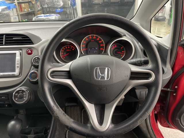 ホンダ フィット G 道央・札幌 2008(平20)年 11.2万km ミラノレッド ・純正ナビ（VXS-092CVi）/・CD/DVD/SD/ワンセグTV/・オートライト/・リモコンキー/・社外ETC/・ABS/・盗難防止装置/・積込スタッドレス社外AW付