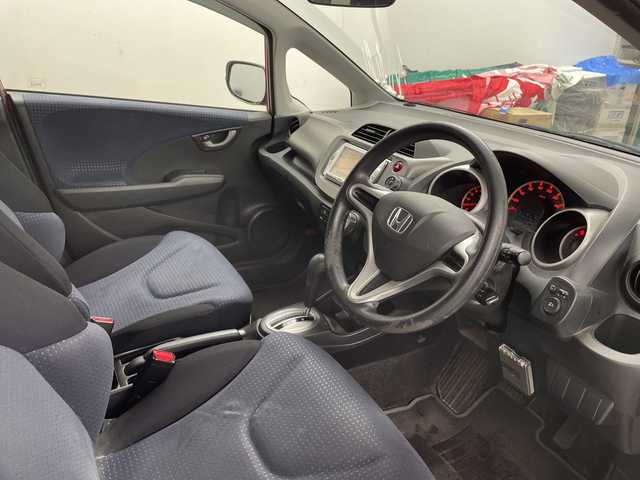 ホンダ フィット G 道央・札幌 2008(平20)年 11.2万km ミラノレッド ・純正ナビ（VXS-092CVi）/・CD/DVD/SD/ワンセグTV/・オートライト/・リモコンキー/・社外ETC/・ABS/・盗難防止装置/・積込スタッドレス社外AW付