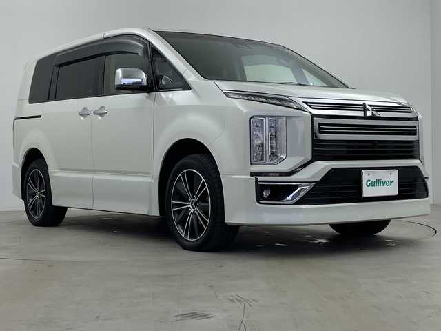 三菱 デリカＤ：５ アーバンギア G パワーパッケージ 鹿児島県 2020(令2)年 5.3万km ウォームホワイトパール 純正10インチナビ/（CD/DVD/BT/SD/USB)/マルチアラウンドモニター/フリップダウンモニター/フルセグテレビ/両側パワースライドドア/電動リアゲート/電動サイドステップ/ドライブレコーダー/ETC/革巻きステアリング/ステアリングスイッチ/プッシュスタート/スマートキー/スペアキー/LEDヘッドライト/LEDフォグランプ/純正18インチアルミホイール/純正フロアマット/純正ドアバイザー/横滑り防止装置