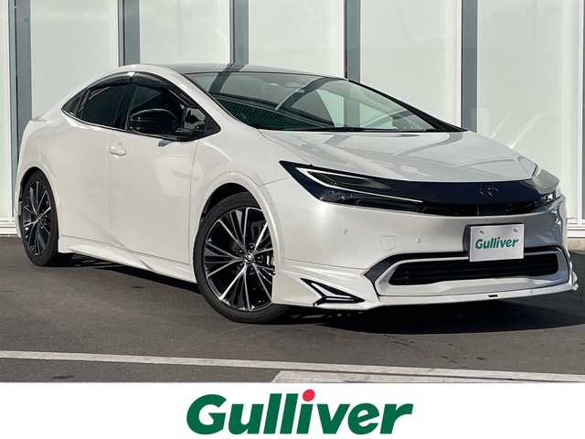 トヨタ プリウス Z 神奈川県 2023(令5)年 1.2万km プラチナホワイトパールマイカ パノラマルーフ/モデリスタフルエアロ/全方位カメラ/純正１２インチナビ/フルセグ/Bluetooth/デジタルインナーミラー/ETC2.0/追従式クルーズコントロール/純正ドライブレコーダー/パワーシート/前席シートヒーター/パーキングアシスト/ステアリングヒーター/レーンキープアシスト/衝突被害軽減システム/盗難防止装置/オートマチックハイビーム/オートライト/スペアキー