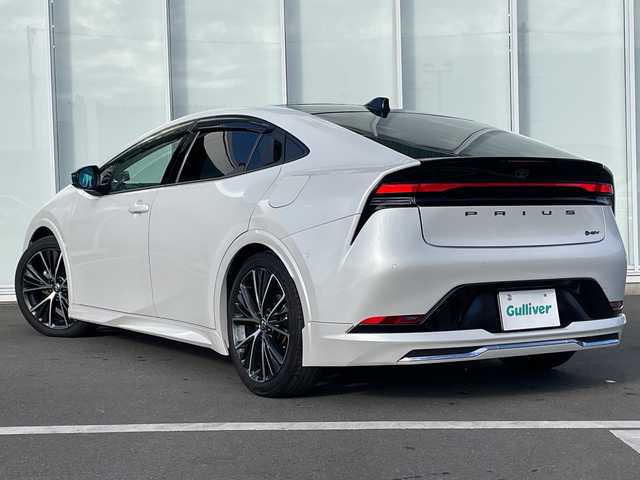 トヨタ プリウス Z 神奈川県 2023(令5)年 1.2万km プラチナホワイトパールマイカ パノラマルーフ/モデリスタフルエアロ/全方位カメラ/純正１２インチナビ/フルセグ/Bluetooth/デジタルインナーミラー/ETC2.0/追従式クルーズコントロール/純正ドライブレコーダー/パワーシート/前席シートヒーター/パーキングアシスト/ステアリングヒーター/レーンキープアシスト/衝突被害軽減システム/盗難防止装置/オートマチックハイビーム/オートライト/スペアキー