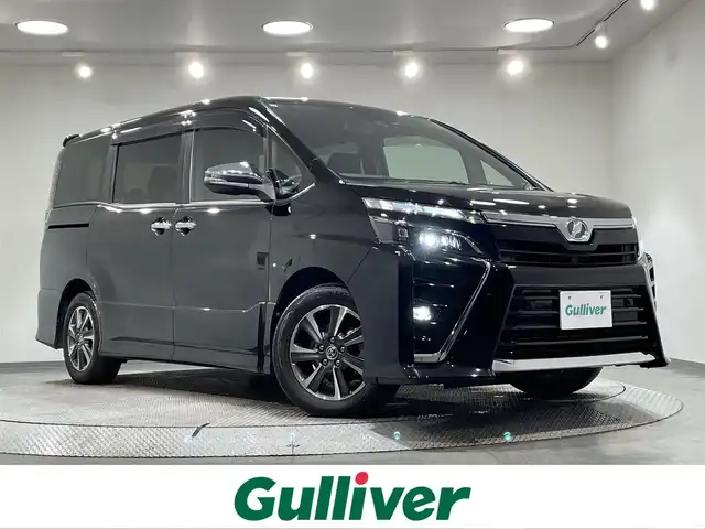 トヨタ ヴォクシー ZS 煌Ⅱ 愛知県 2019(令1)年 7.8万km ブラック 純正10incSDナビ/CD/DVD/BT/フルセグTV/バックカメラ/純正ETC2.0/トヨタセーフティーセンス/衝突軽減ブレーキ/車線逸脱警報/クリアランスソナー/先行車お知らせ機能/クルーズコントロール/両側パワースライドドア/LEDヘッドライト/オートライト/オートハイビーム/スマートキー/プッシュスタート