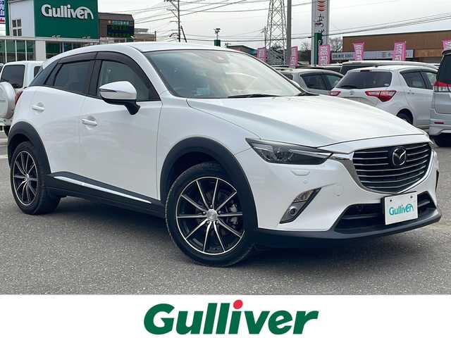 マツダ ＣＸ－３ XD Lパッケージ 秋田県 2018(平30)年 1.8万km スノーフレイクホワイトパールマイカ 登録時走行距離17791km/４WD/純正HDDナビ/CD/DVD/Bluetooth/バックカメラ/フルセグTV/ETC/前方ドライブレコーダー/横滑り防止装置/レーンキープアシスト/盗難防止装置/衝突被害軽減システム/車線逸脱警報/ステアリングヒーター/運助シートヒーター/運転席パワーシート/格納ウィンカーミラー/社外AW/LEDヘッドライト/フォグランプ/スマートキー/スペアキー