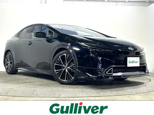 トヨタ プリウス Z 大阪府 2023(令5)年 1.1万km アティチュードブラックマイカ サンルーフ　黒革シート　モデリスタエアロ　１２．３ｉｎｃナビＴＶ　３６０カメラ　デジタルインナーミラー　衝突軽減　ＢＳＭ　アドバンストパーク　パワーシート／ヒーター　電動リアゲート　１００Ｖ電源