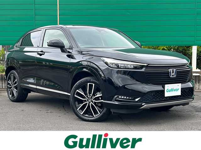 ホンダ ヴェゼル ハイブリッド e:HEV Z 茨城県 2022(令4)年 1.8万km クリスタルブラックパール Honda CONNECTディスプレイ/Bluetooth/フルセグTV/バックカメラ/ホンダセンシング/・衝突軽減ブレーキ/・アダプティブクルーズコントロール/・ブラインドスポットインフォメーション/・車線維持支援システム/・誤発進抑制機能/・標識認識機能/・後退出庫サポート/・オートマチックハイビーム/置くだけ充電/ビルトインETC2.0/ハンズフリーパワーバックドア/ハーフレザーシート/前席シートヒーター/ステアリングヒーター/ワイパーデアイサー/純正18インチAW/オートライト/LEDヘッドライト
