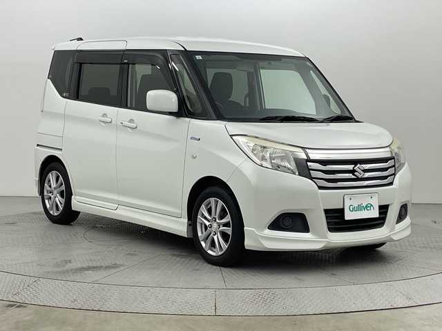 スズキ ソリオ HV MX 新潟県 2017(平29)年 7.9万km ピュアホワイトP 4WD/社外ナビ/　　フルセグ/CD/DVD/SD/BT/AM/FM/左側パワースライド/シートヒーター/純正15アルミホイール/オートエアコン/アイドリングストップ/純正フロアマット/スマートキー/ETC