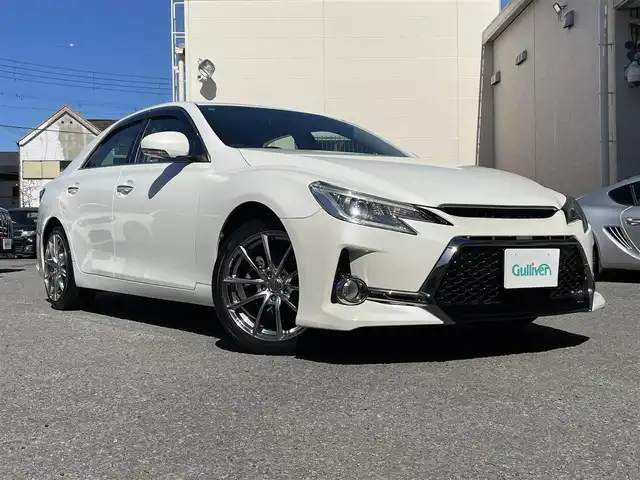 トヨタ マークＸ 250G リラックスセレクション 和歌山県 2010(平22)年 6.1万km ホワイトパールクリスタルシャイン ”(株)IDOMが運営する【じしゃロン甲府店】の自社ローン専用車両になります。/こちらは現金またはオートローンご利用時の価格です。自社ローンご希望の方は別途その旨お申付け下さい/社外フロントバンパー/社外ヘッドライト/社外グリル/→純正と酷似してますが、海外仕様です/スマートキー２個/ＥＮＫＥＩ１８インチアルミ/純正ナビ・フルセグＴＶ/ＣＤ・ＤＶＤ・ＢＴオーディオ/バックカメラ/ＥＴＣ/前席パワーシート/取説・ナビ説