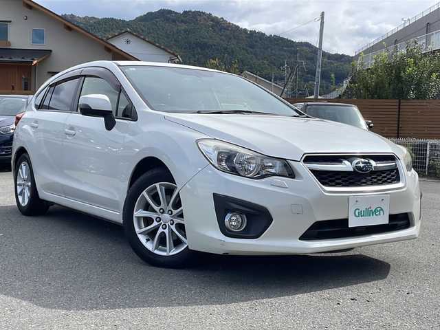 スバル インプレッサ スポーツ 2．0i 山梨県 2013(平25)年 5.7万km サテンホワイトパール 純正SDナビ/FM・AM・Bluetooth・フルセグTV/ETC/クルーズコントロール（追従走行なし）/ドライブレコーダー/パドルシフト/アイドリングストップ/純正アルミホイール/フォグランプ/ドアバイザー/ウインカーミラー/純正フロアマット