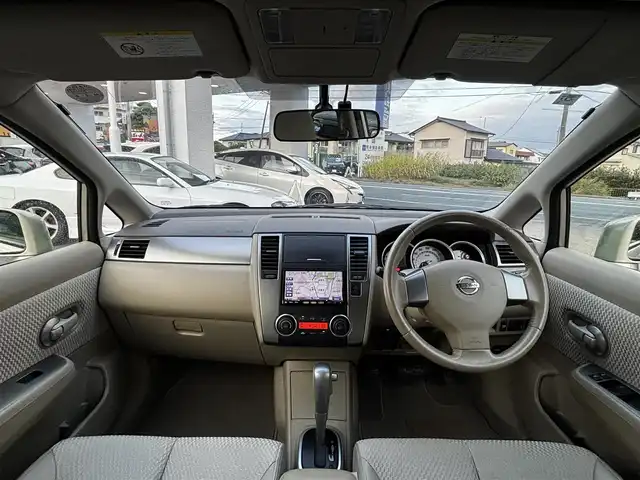 日産 ティーダ 15M SV +プラズマ 熊本県 2012(平24)年 7.4万km シルキーベージュ 純正7インチナビ(MP311D-A)/【ワンセグTV/Bluetooth/DVD/CD】/オートライト/ETC/純正フロアマット/取扱説明書