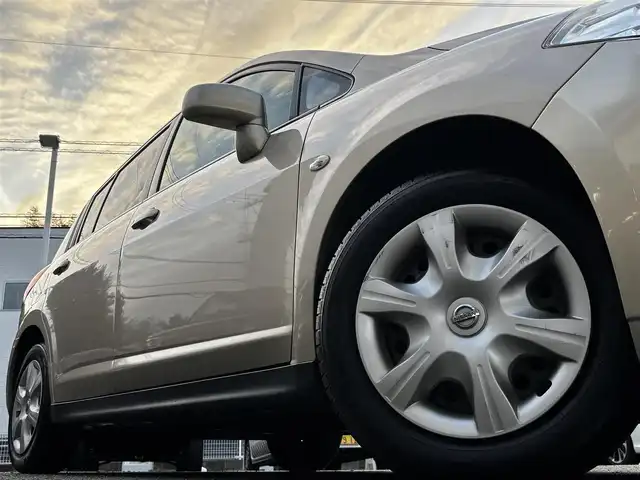 日産 ティーダ 15M SV +プラズマ 熊本県 2012(平24)年 7.4万km シルキーベージュ 純正7インチナビ(MP311D-A)/【ワンセグTV/Bluetooth/DVD/CD】/オートライト/ETC/純正フロアマット/取扱説明書