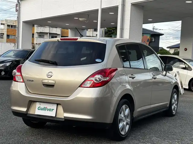 日産 ティーダ 15M SV +プラズマ 熊本県 2012(平24)年 7.4万km シルキーベージュ 純正7インチナビ(MP311D-A)/【ワンセグTV/Bluetooth/DVD/CD】/オートライト/ETC/純正フロアマット/取扱説明書