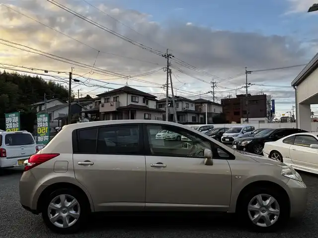 日産 ティーダ 15M SV +プラズマ 熊本県 2012(平24)年 7.4万km シルキーベージュ 純正7インチナビ(MP311D-A)/【ワンセグTV/Bluetooth/DVD/CD】/オートライト/ETC/純正フロアマット/取扱説明書