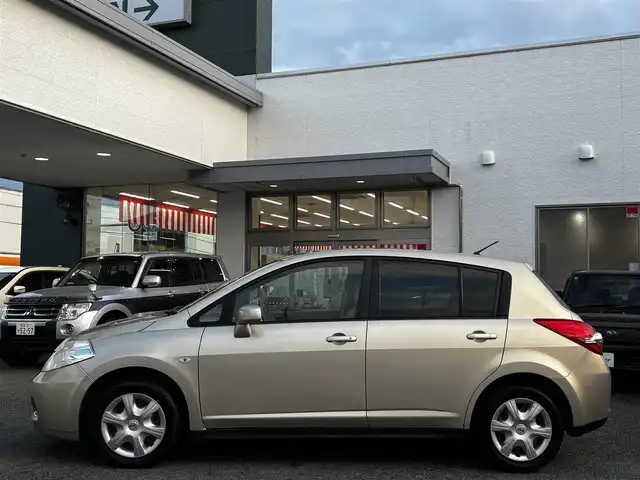 日産 ティーダ 15M SV +プラズマ 熊本県 2012(平24)年 7.4万km シルキーベージュ 純正7インチナビ(MP311D-A)/【ワンセグTV/Bluetooth/DVD/CD】/オートライト/ETC/純正フロアマット/取扱説明書